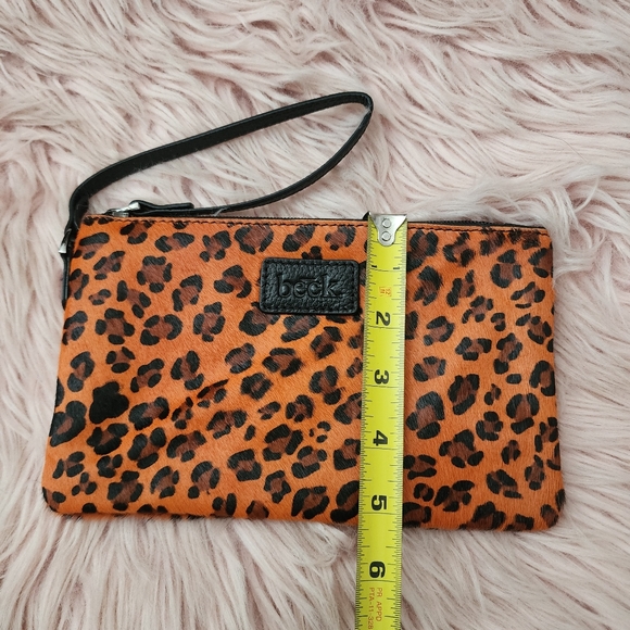 Beck. Ziplet Bags Wild Child Orange leopard print calf hair wristlet